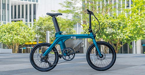 Side view of Fiido X e-bike on city pavement