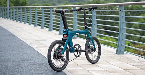 Rear oblique view of the Fiido X e-bike parked on the bridge